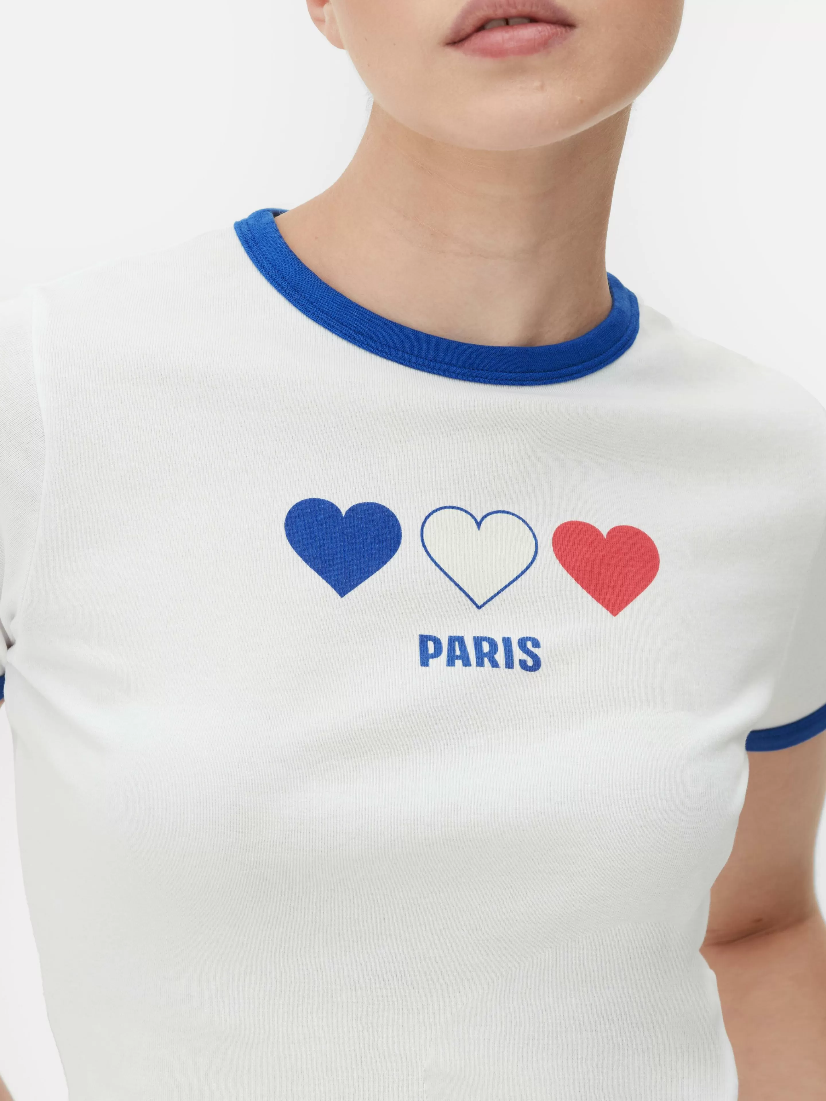 Mujer Primark Tops Y Camisetas | Camiseta Corta Con Ribetes Con El Eslogan «Paris»
